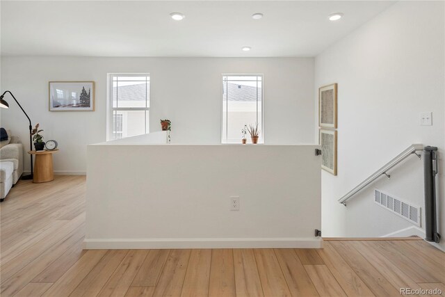6099 N Netherland Ct, Aurora, CO 80019 - interior space featuring plenty of natural light, light wood-style floors, baseboards, and recessed lighting