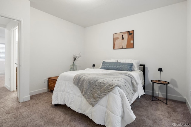 6099 N Netherland Ct, Aurora, CO 80019 - carpeted bedroom featuring baseboards