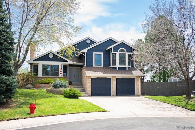 18 Brixham Ct, Castle Pines, CO 80108 - tri-level home featuring a garage, driveway, brick siding, and a chimney