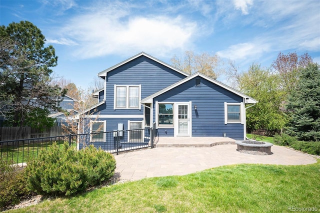 18 Brixham Ct, Castle Pines, CO 80108 - rear view of property with a patio area and an outdoor fire pit