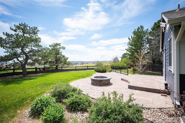 18 Brixham Ct, Castle Pines, CO 80108 - view of patio with a fire pit