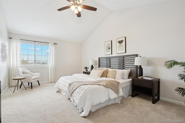 bedroom with baseboards, a ceiling fan, lofted ceiling, and light carpet