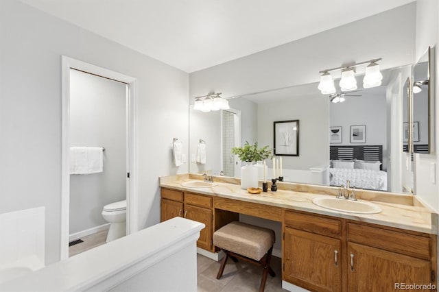 full bathroom featuring double vanity, toilet, visible vents, and a sink