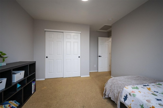 carpeted bedroom with a closet