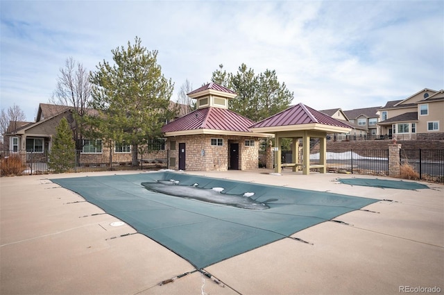 view of swimming pool featuring a gazebo and a patio