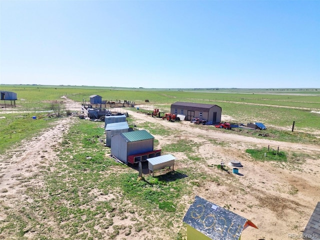5525 S Johnson Rd, Rush, CO 80833 - view of yard featuring a view of countryside and an outbuilding