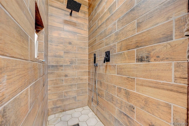 5525 S Johnson Rd, Rush, CO 80833 - full bathroom featuring tiled shower