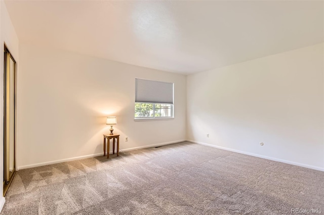 13940 E Linvale Pl, Aurora, CO 80014 - carpeted spare room featuring baseboards