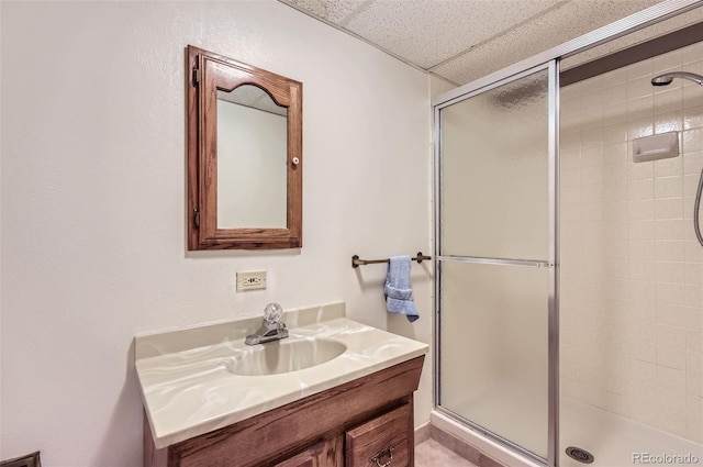 13940 E Linvale Pl, Aurora, CO 80014 - bathroom with a stall shower, vanity, and a paneled ceiling