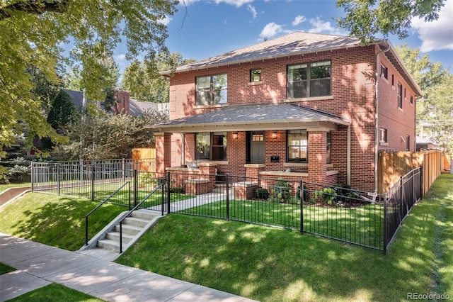 view of front of house featuring covered porch and a front lawn