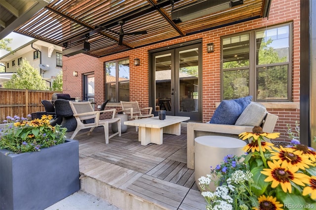 wooden deck featuring an outdoor hangout area