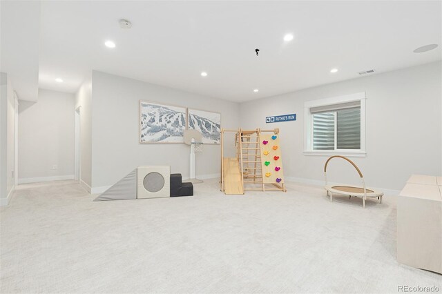 playroom with light carpet