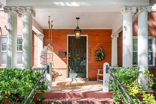 entrance to property with a porch