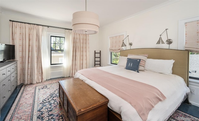 bedroom with crown molding