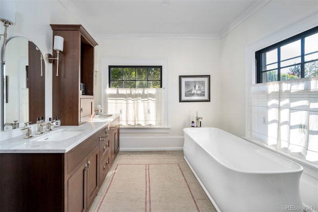 bathroom with vanity, crown molding, a bath, and tile patterned floors