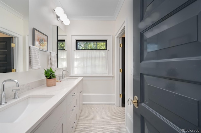 bathroom featuring vanity, crown molding, and tile patterned floors