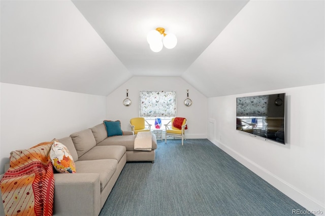 carpeted living room featuring vaulted ceiling