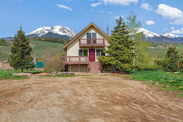 301 Lagoon Ln, Silverthorne, CO 80498 - view of front of house with a balcony and a mountain view