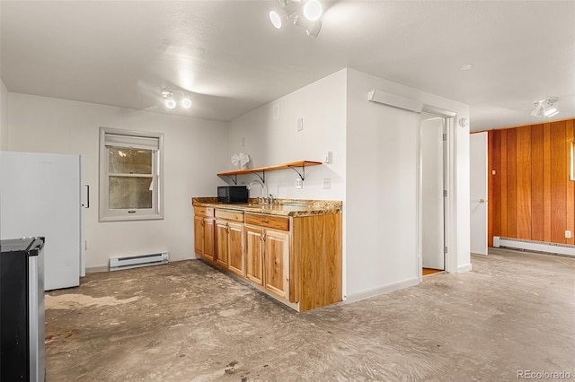 301 Lagoon Ln, Silverthorne, CO 80498 - kitchen with a baseboard radiator, open shelves, concrete flooring, and brown cabinetry