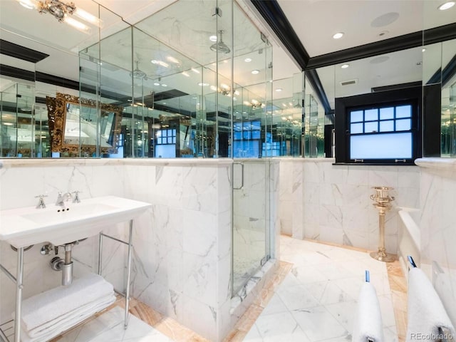 bathroom featuring an enclosed shower, tile walls, and crown molding