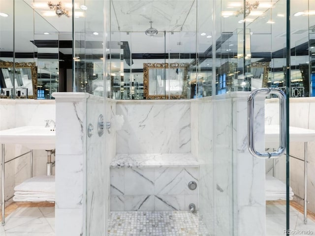 bathroom with a shower with shower door