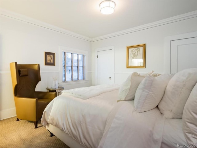 carpeted bedroom featuring ornamental molding