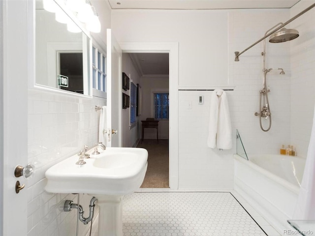 bathroom featuring ornamental molding, tile walls, tile patterned floors, and shower / bath combo