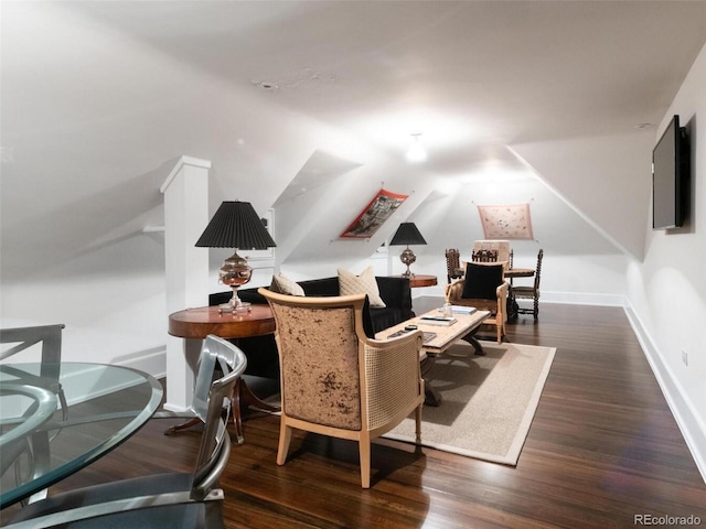 sitting room featuring dark wood-type flooring