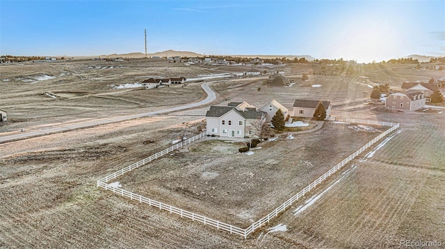 birds eye view of property featuring a rural view