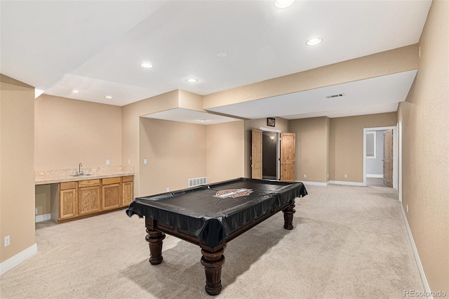 recreation room featuring light carpet, wet bar, and pool table