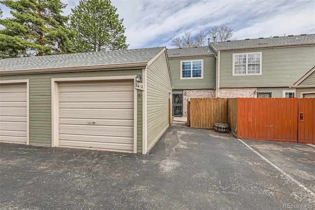 garage featuring fence