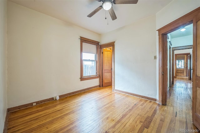 3024 W Denver Pl, Denver, CO 80211 - spare room featuring light wood finished floors, a ceiling fan, and baseboards