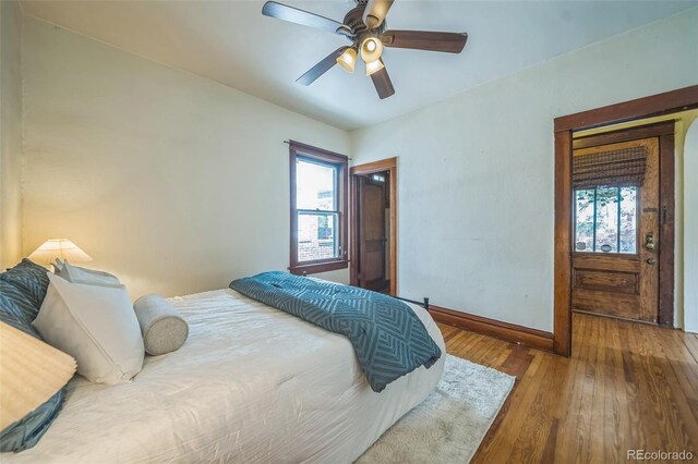3024 W Denver Pl, Denver, CO 80211 - bedroom featuring hardwood / wood-style floors, baseboards, and a ceiling fan