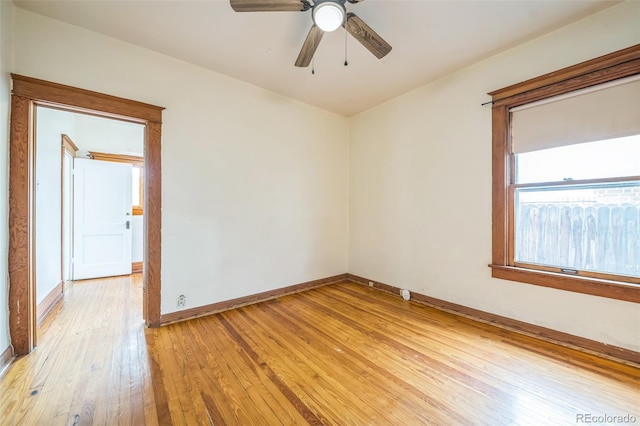 3024 W Denver Pl, Denver, CO 80211 - empty room with light wood finished floors, baseboards, and a ceiling fan