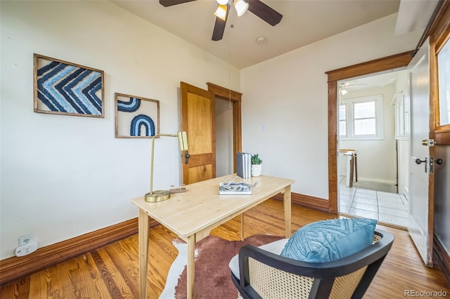 3024 W Denver Pl, Denver, CO 80211 - home office with a ceiling fan, light wood finished floors, and baseboards