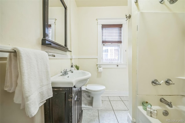 3024 W Denver Pl, Denver, CO 80211 - full bath with tile patterned floors, toilet, vanity, and bathing tub / shower combination