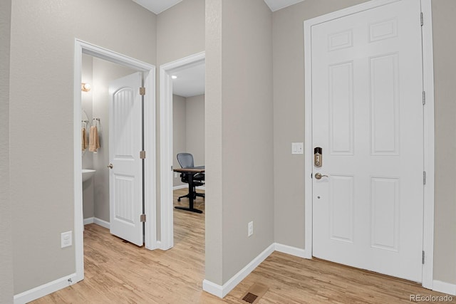 5166 Trails Edge Ln, Castle Rock, CO 80104 - foyer with light wood-style floors and baseboards