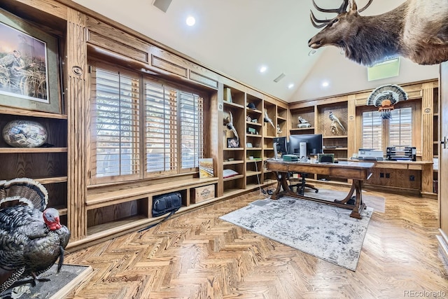 home office with vaulted ceiling and light parquet floors