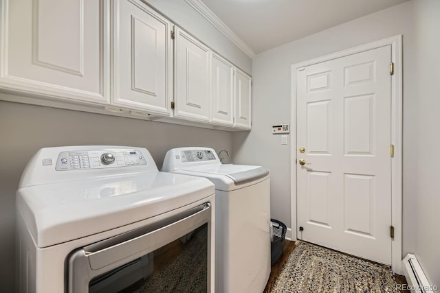 laundry room featuring cabinets, separate washer and dryer, baseboard heating, and ornamental molding