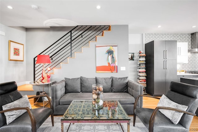 3617 Shoshone St, Denver, CO 80211 - living room with stairs, light wood-style flooring, and recessed lighting