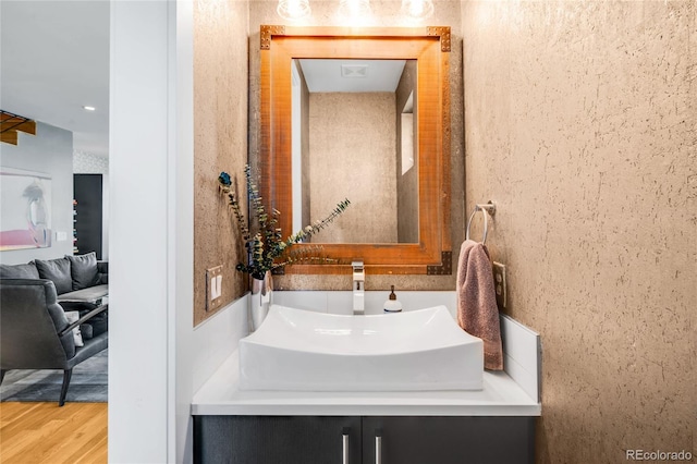 3617 Shoshone St, Denver, CO 80211 - bathroom with vanity and wood finished floors