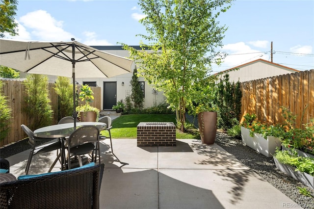 3617 Shoshone St, Denver, CO 80211 - fenced backyard with a patio and outdoor dining space