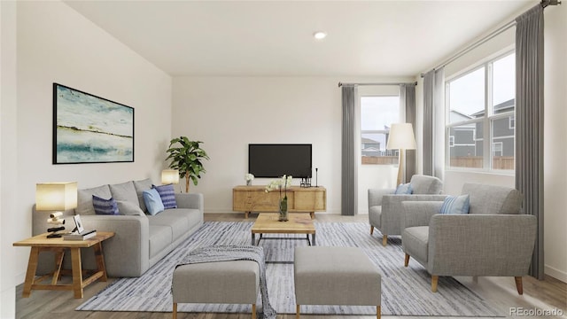 living room with light hardwood / wood-style flooring