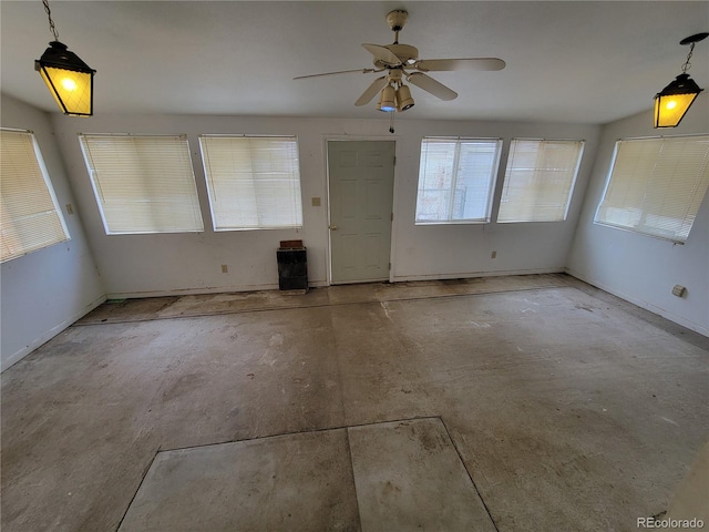 unfurnished room with ceiling fan