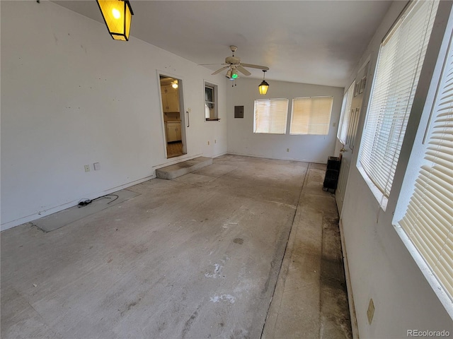 interior space featuring lofted ceiling and ceiling fan