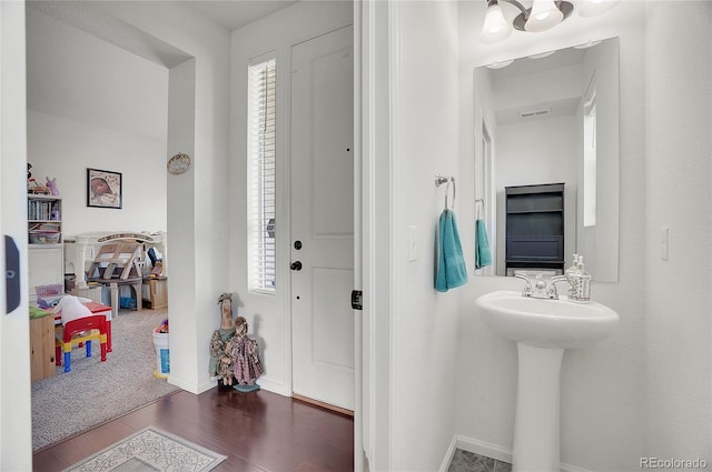 bathroom featuring wood-type flooring