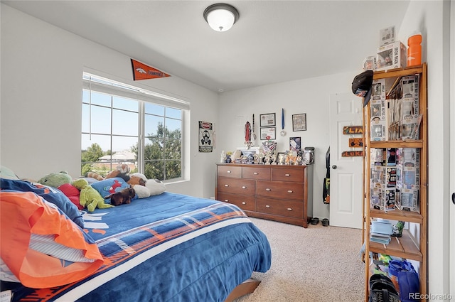 bedroom featuring light colored carpet