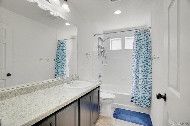 full bathroom with vanity, toilet, tile patterned floors, and shower / bath combo