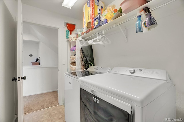 laundry area with washing machine and dryer