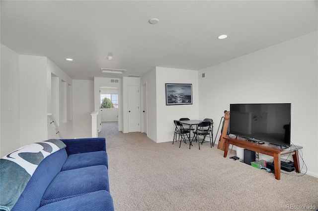 living room featuring carpet